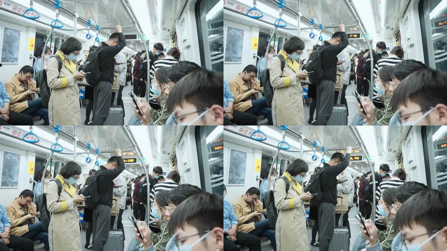 地铁看手机