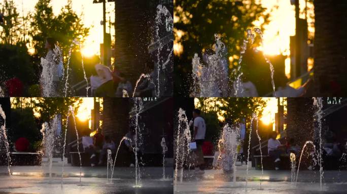 夕阳下公园喷泉和行人的温馨画面