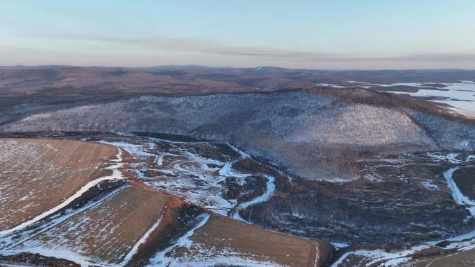 航拍内蒙古冰消雪融原野大地