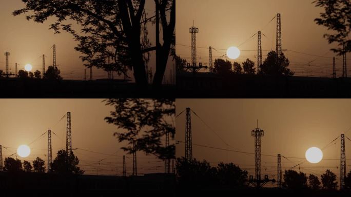 农村清晨火车站情感，剪影，日出，太阳