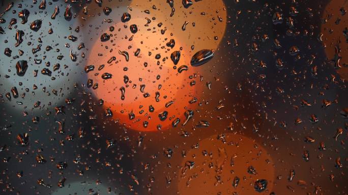 雨夜窗户玻璃上的雨滴特写虚化光斑2