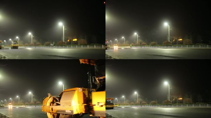 夜间拍摄自动铺路机铺设沥青路面