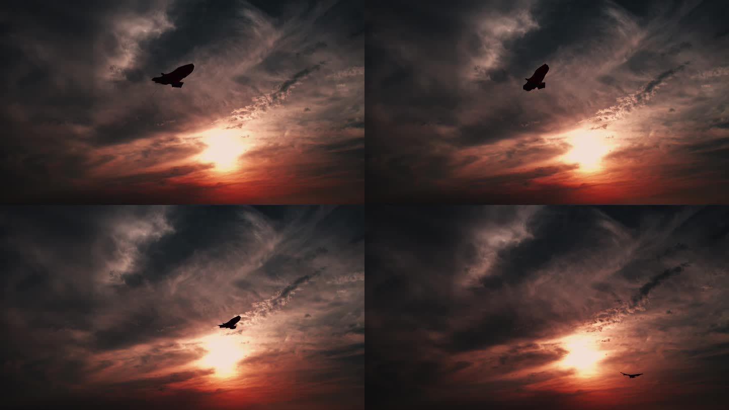 风筝在夕阳的余晖中迎风飞翔风筝视频素材