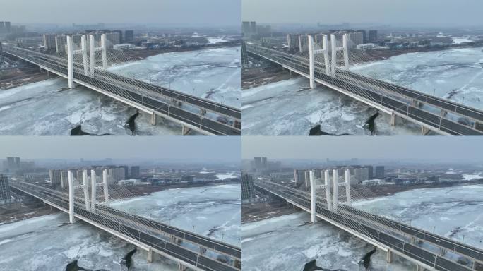 吉林珲春市森林山大桥航拍城市冬季风光