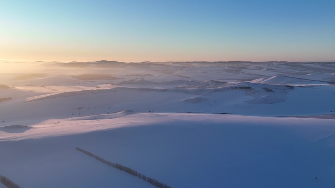 航拍4K东北垦区田野雪景暮色