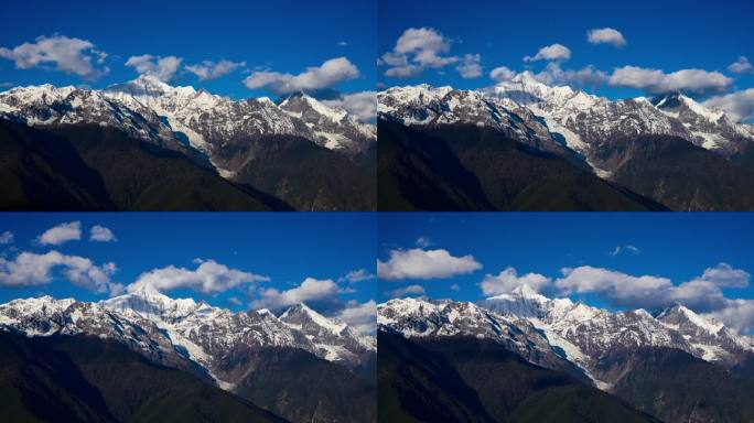 蓝天白云下的梅里雪山延时摄影