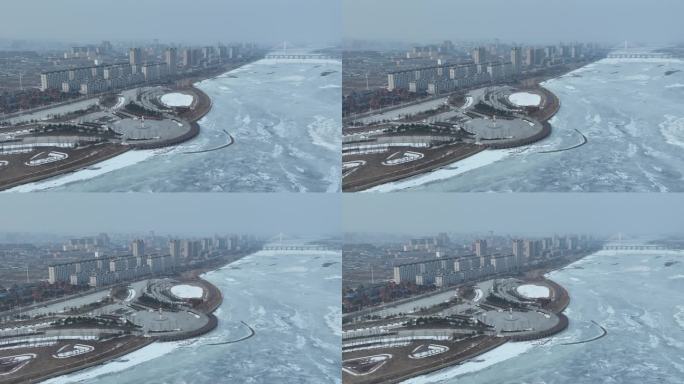 吉林珲春市冬季珲春河城市风光航拍