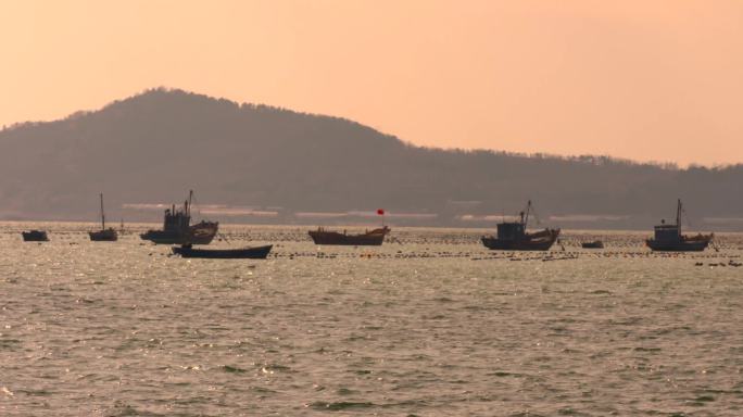 渔港归船 港口码头 海上日落