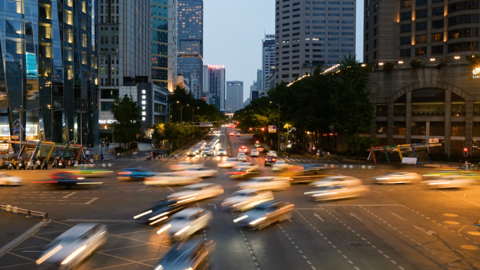 都市街道夜景城市生活节奏路口车辆延时素材