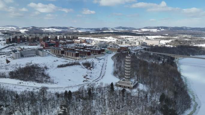 白山市抚松县城市建筑航拍冬季雪原风光