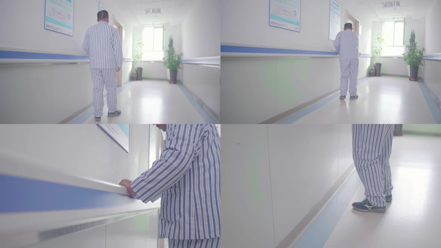 医院走廊里病人扶着扶手缓慢行走
