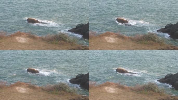 悬崖海边涨潮仙人井景区