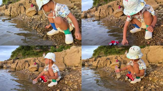 小朋友在河边玩水玩玩具
