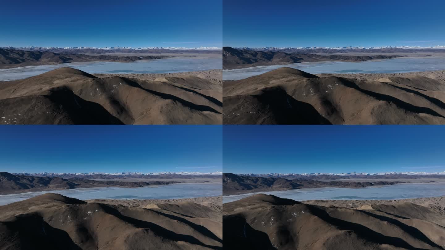 西藏当却藏布水系沙漠湖水雪山同一画面