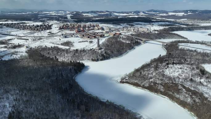 白山市抚松县城市建筑航拍冬季雪原风光