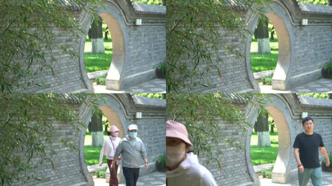 游客经过圆形拱门实拍人文4K