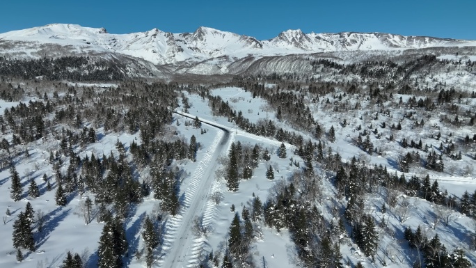 航拍吉林长白山雪原森林公路自然风光