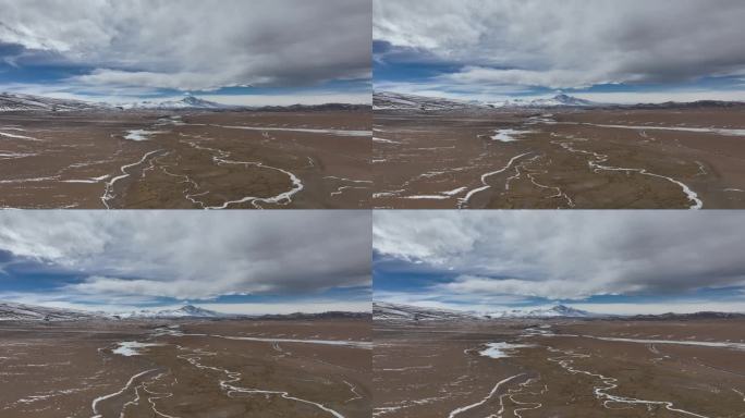 高原湿地航拍纳木那尼峰雪融水冰河