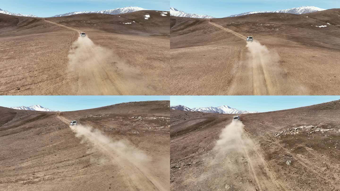 荒漠中飞驰的越野汽车4K航拍