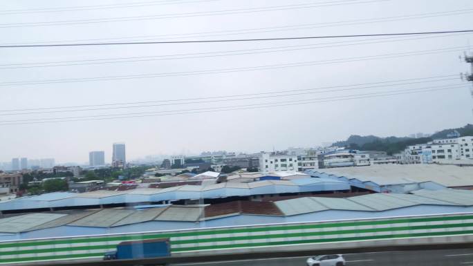 高铁动车火车视角沿途窗外风景厂房