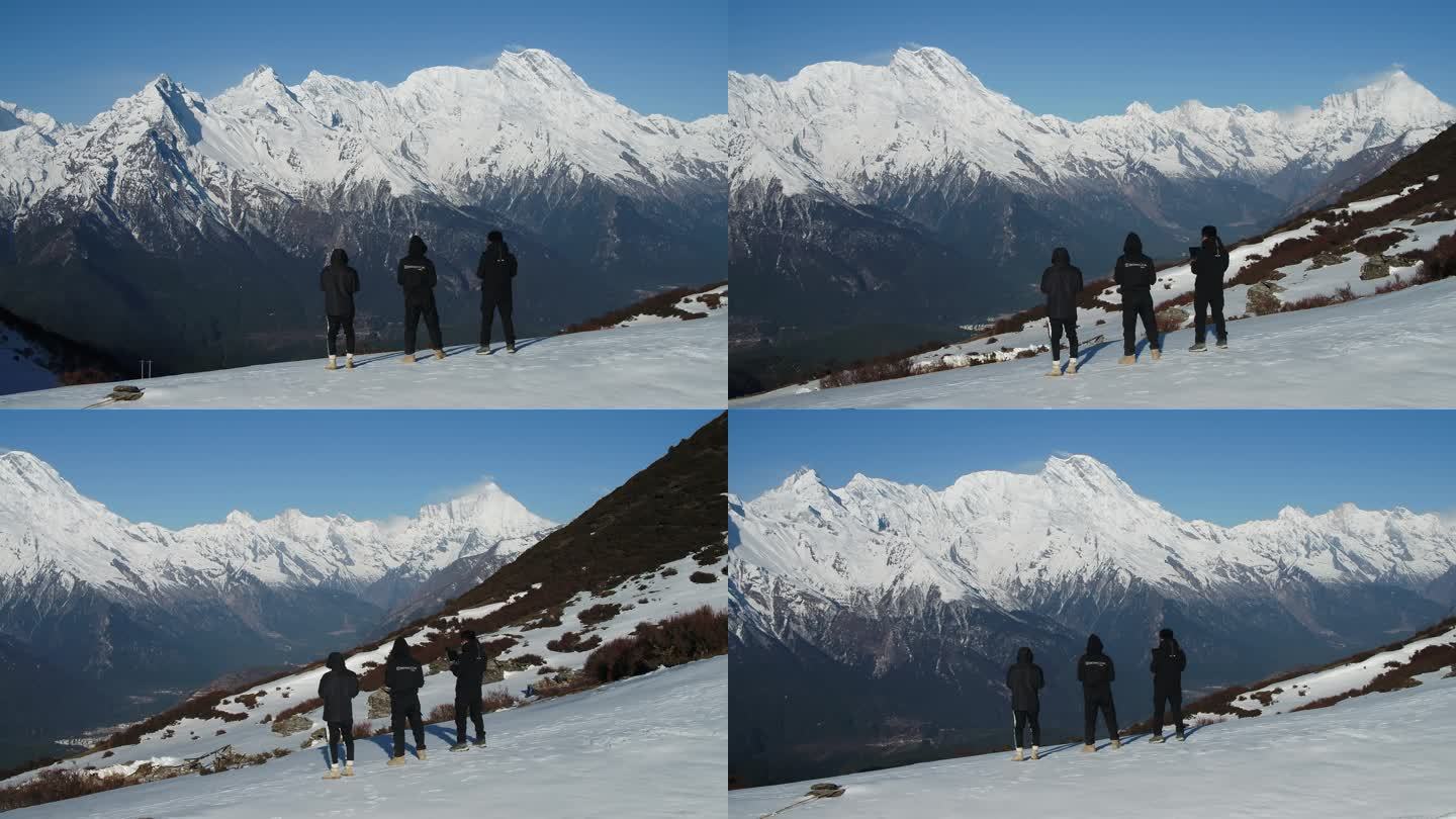 西藏雪山山垭口人物站立航拍