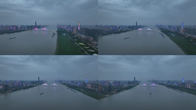 武汉长江两岸傍晚蓝调时刻的灯光秀航拍