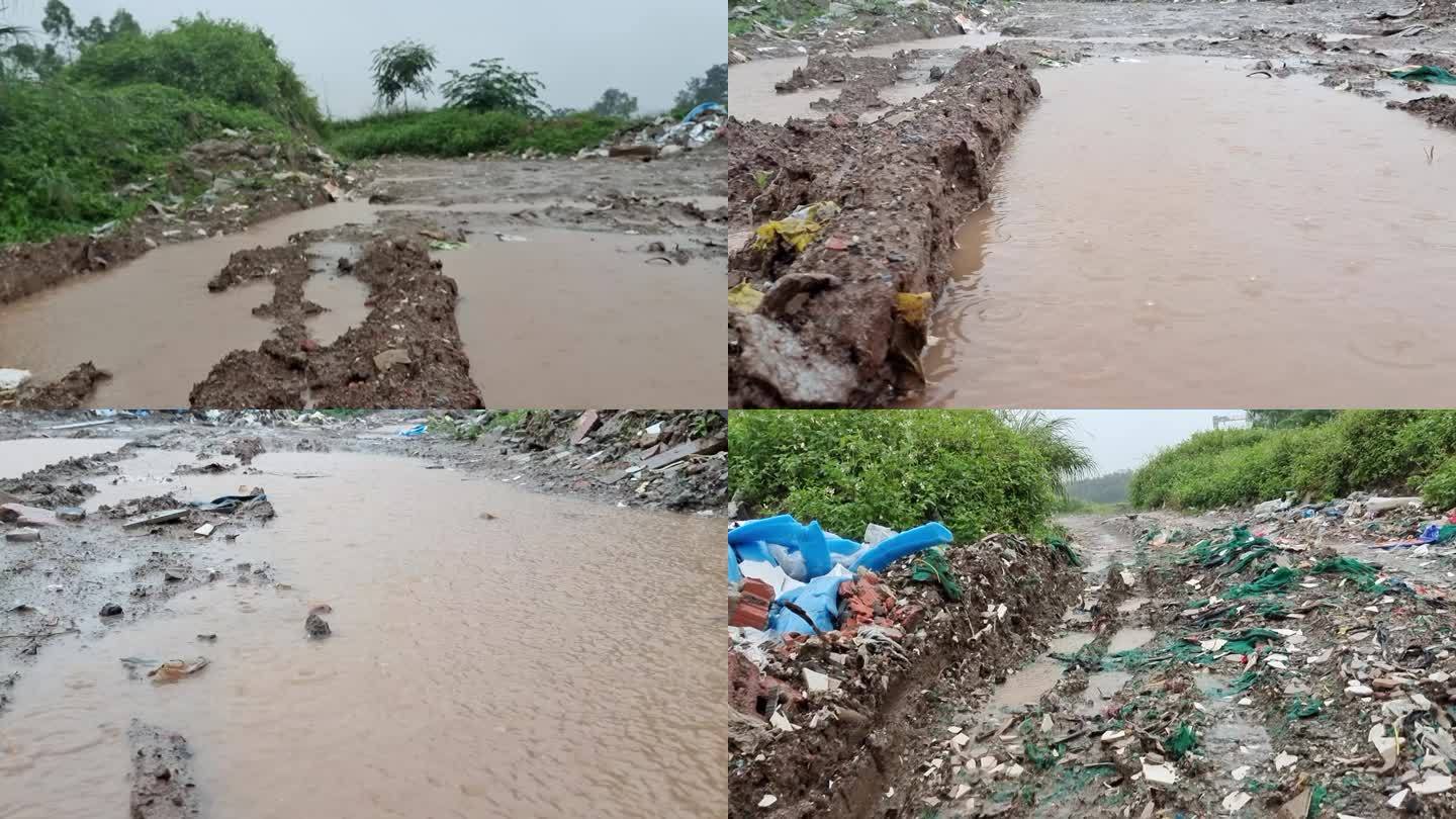 农村泥地下雨后的积水路面泥地行走实拍素材