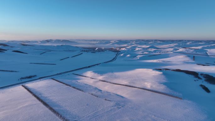 航拍4K东北雪色原野暮色