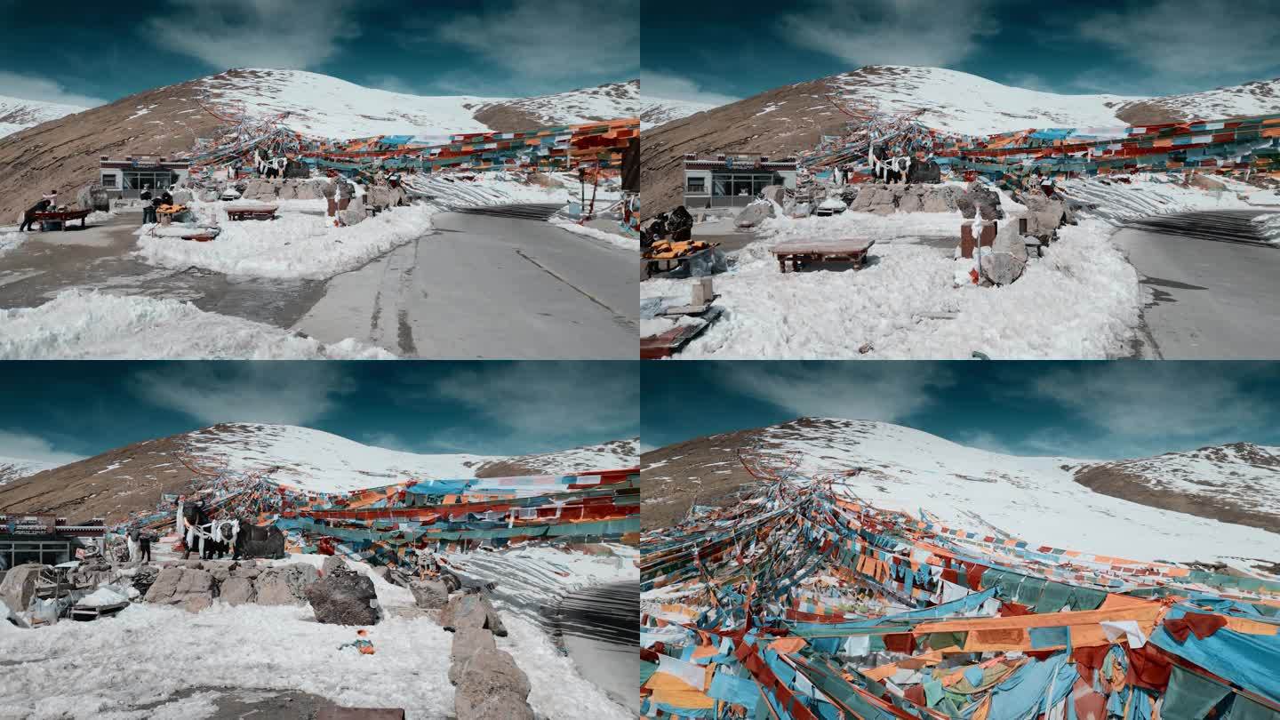 西藏风光318国道米拉山口经幡雪山白雪