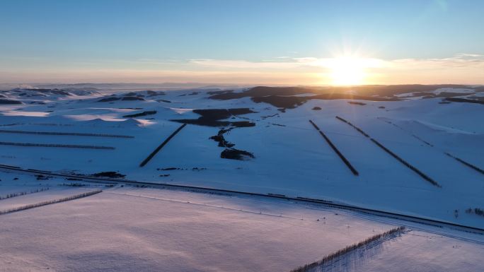 航拍4K东北雪色原野暮色