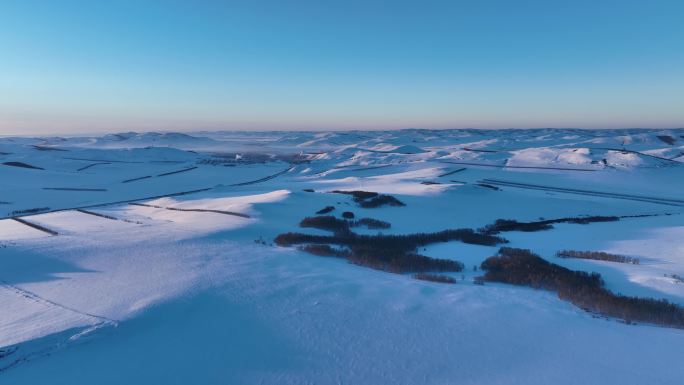 航拍4K东北雪色原野暮色