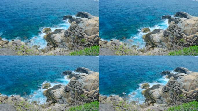 海景海边浪花 蓝色海水 海浪拍打礁石岩石