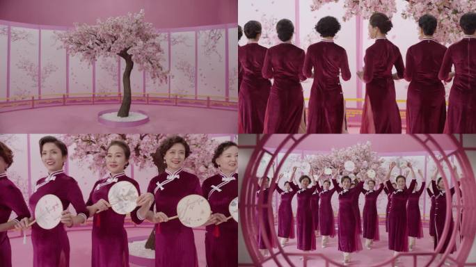 唯美桃花树一群旗袍女持扇团走秀展示好状态