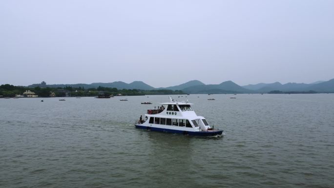 0100高清4k航拍杭州西湖游船环绕拍摄