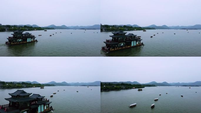 0101高清4k航拍杭州西湖游船跟拍小舟