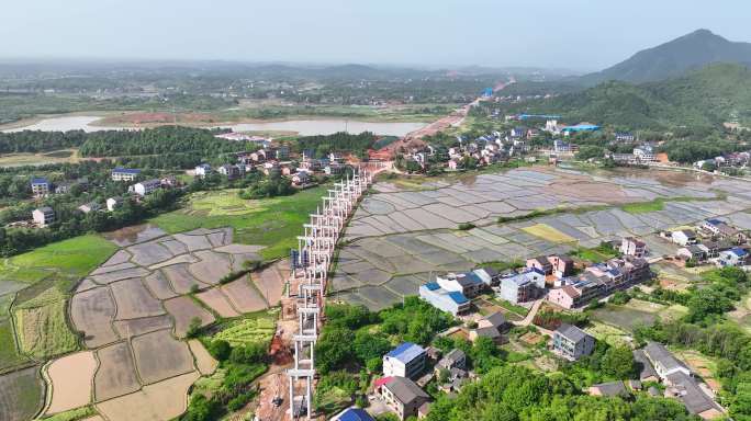 4K航拍农村农田里修建国家高速公路3