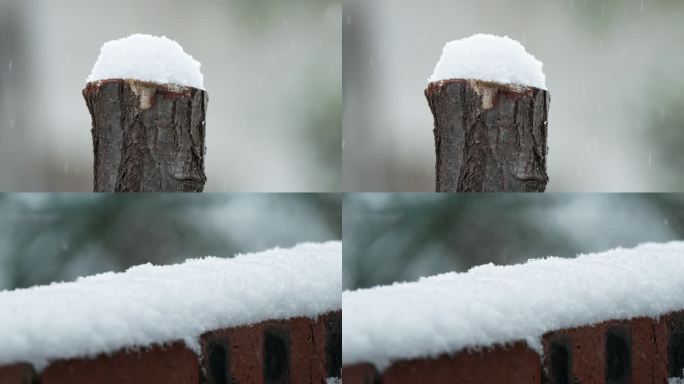 冬天季下雪木桩砖墙积白飘雪皑