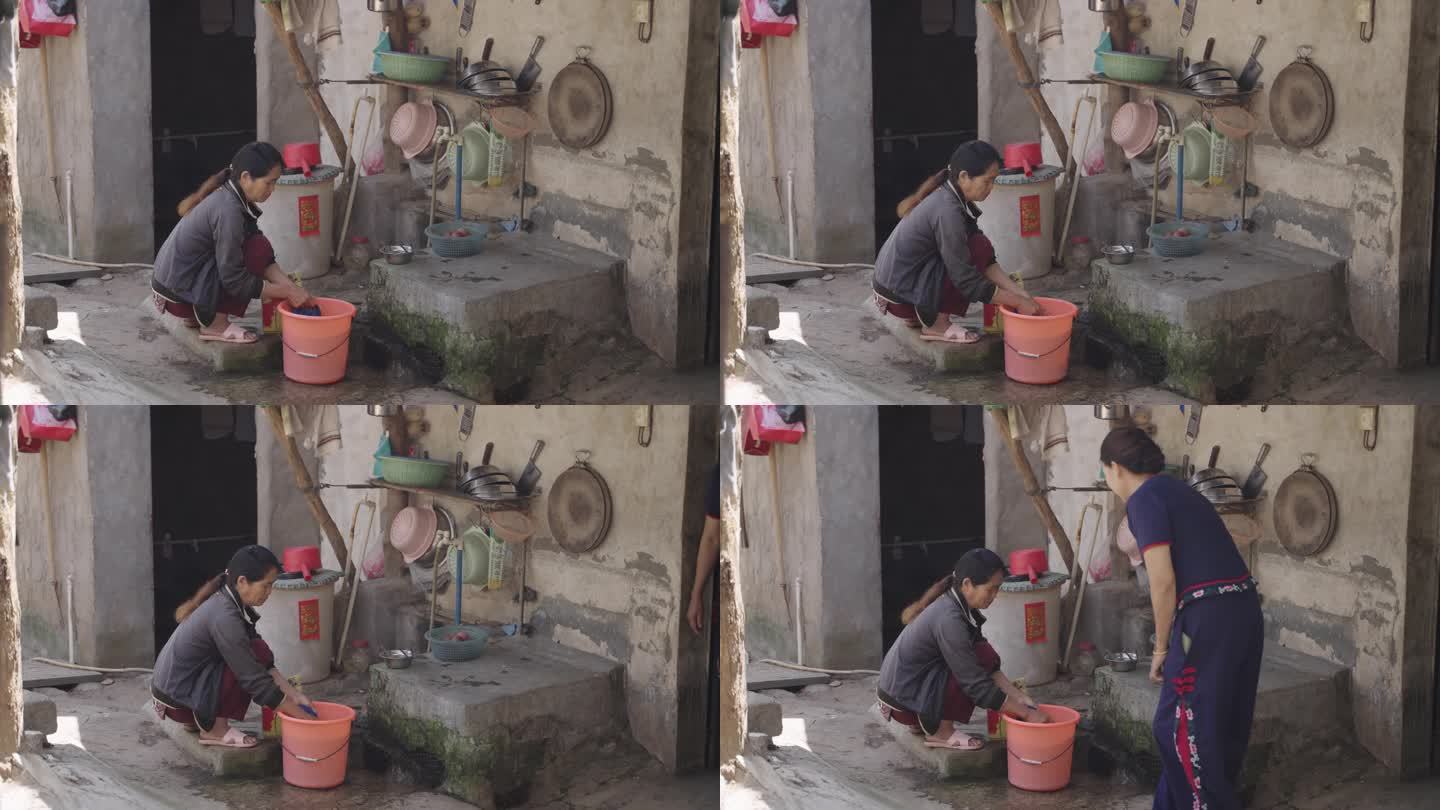 村里妇女洗衣服家里洗衣服农村生活气息场景
