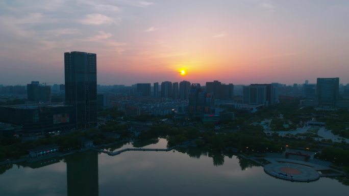 4k盐城聚龙湖航拍落日夜景