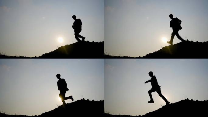 登山者户外 运动 跨越 跨步夕阳登山鞋