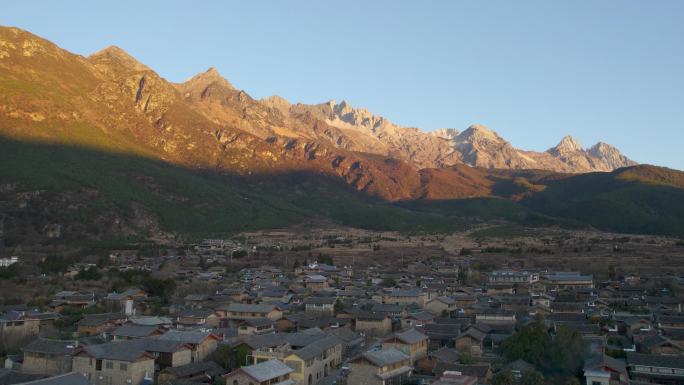 4K云南丽江玉湖村玉龙雪山日出航拍视频