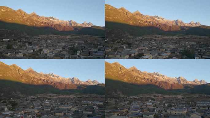 4K云南丽江玉湖村玉龙雪山日出航拍视频