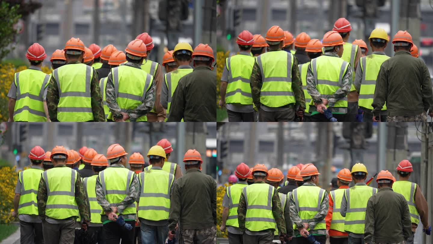 工人背影一群工地工人工人上班下班社会建筑