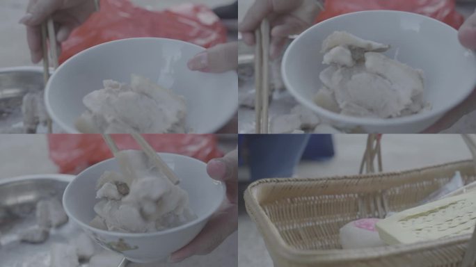 h用筷子将煮好的肉夹进碗里