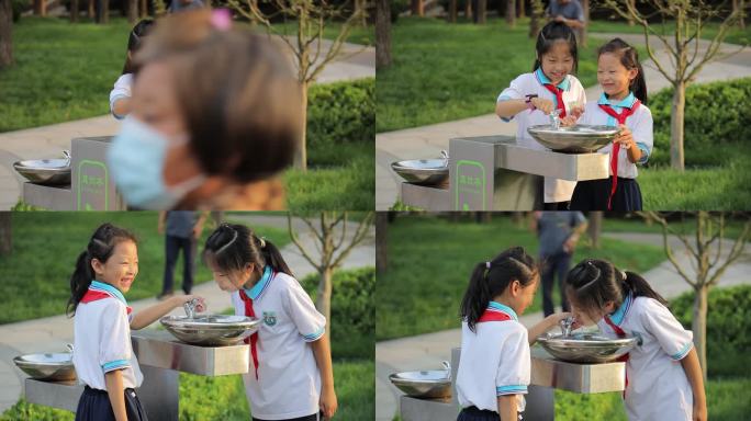 小学生公园直饮水喝水