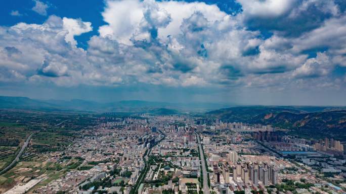 平凉大景城市上空航拍延时白云翻滚蓝天