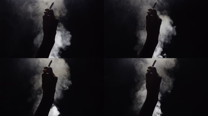 一只手叼着香烟烟雾慢镜头3