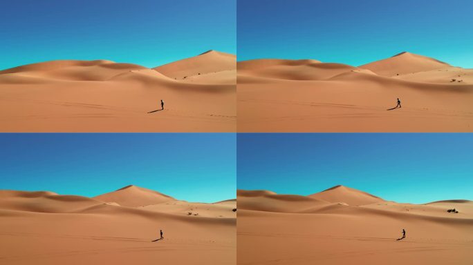戈壁沙漠行走的人徒步航拍