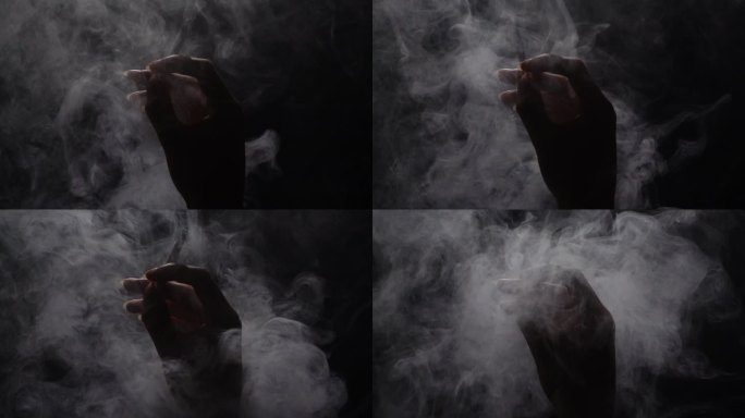 一只手叼着香烟烟雾慢镜头9