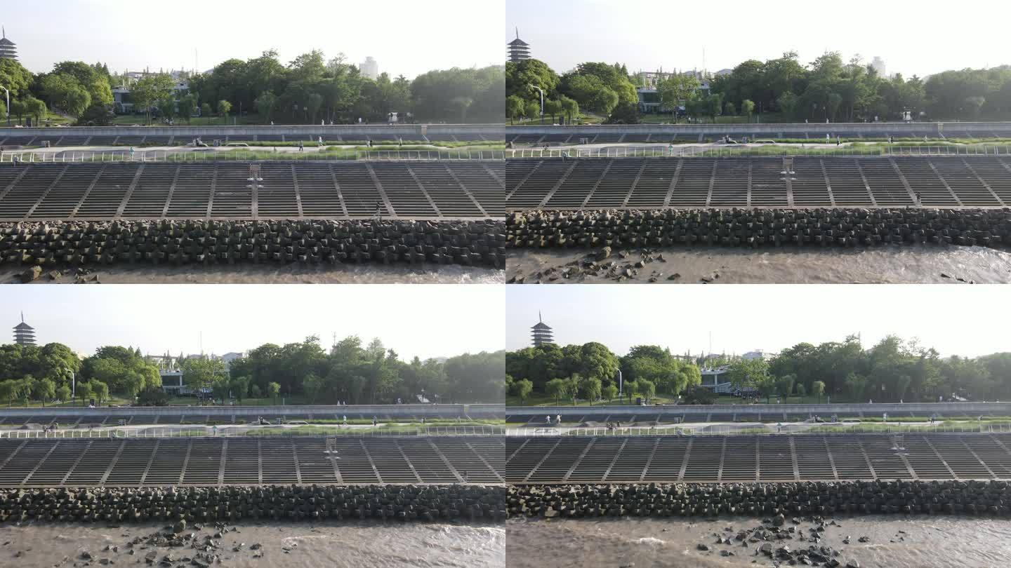 长江河堤礁石护水墙江浪水4K航拍原素材